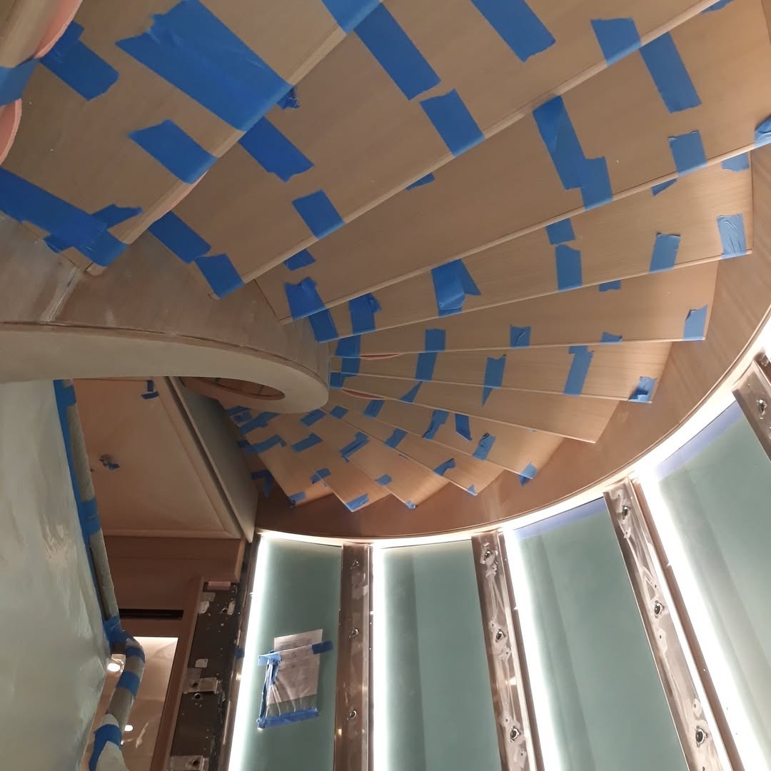 before picture of scluptural staircase touch up image